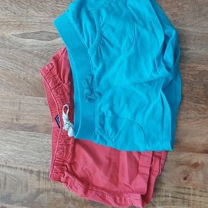 red landsend Medium 5-6 and a blue jumping bean medium 6 shorts